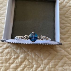 😁 4/$10 Synthetic blue topaz bracelet.